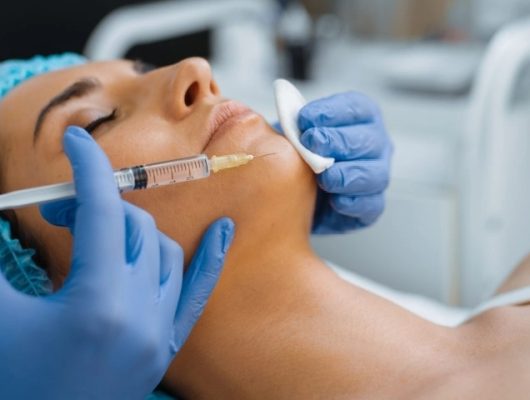 cosmetician-gives-chin-botox-injection-to-patient-e1632845020808@2x